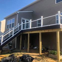 Brand new deck with new guts and post Black trim with white railing black balusters
