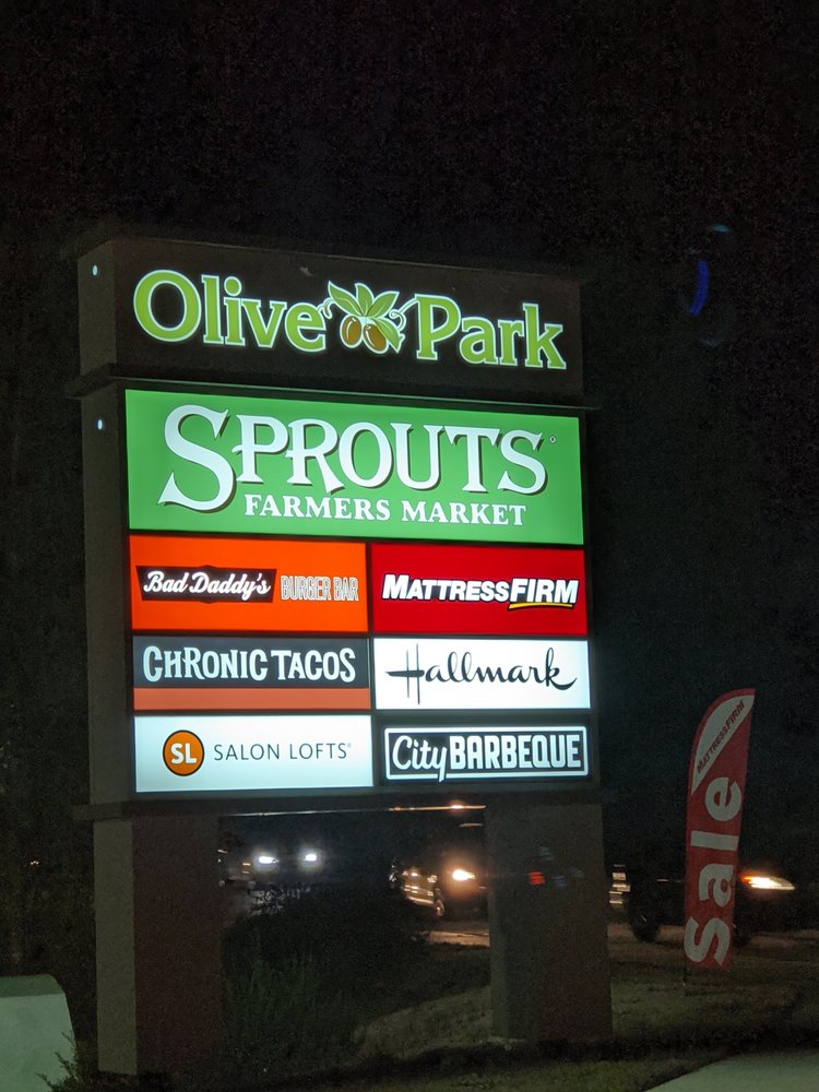 Olive Park Shopping Center Logo