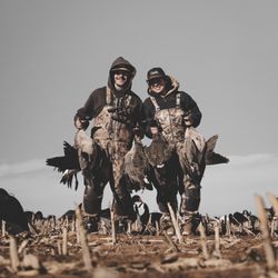 Cadillac Creek Outfitters - This is a picture after a hunt with some birds. Jadon, one of their guides is funny and a great guide (which he is on the left)