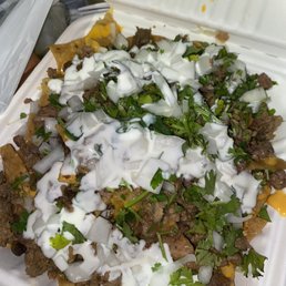 Carne asada super nachos.  Super where? 2/10