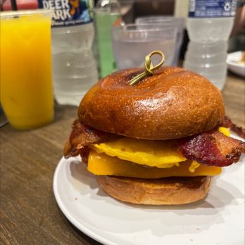 Eggcellent Cafe - Sunrise Sammie  Eggs with cheese, crispy bacon and hash browns on a brioche bun. Very filling!!! - Coffee & Tea Near Me - Philadelphia, Pennsylvania