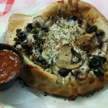 Rosa's Pizza - Calzone with olives, mushrooms and sausage. Overflowing with toppings and so very tasty!! - Pizza Near Me - Atlanta, Georgia Rosa's Pizza - Calzone with olives, mushrooms and sausage. Overflowing with toppings and so very tasty!! - Pizza Near Me - Atlanta, Georgia
