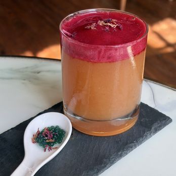 Blush Restaurant & Bakery - Verse of Blossoms cocktail: tequila, lemon juice, jasmine simple syrup, hibiscus-strawberry foam, jasmine caviar - Breakfast & Brunch Near Me - San Antonio, Texas