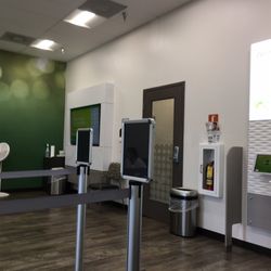 Quest Diagnostics - TV screen with appointment wait times