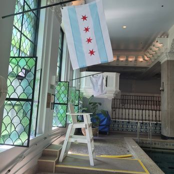 InterContinental Chicago Magnificent Mile - Pool with lifeguard chair and Chicago flag - Hotels Near Me - Chicago, Illinois InterContinental Chicago Magnificent Mile - Pool with lifeguard chair and Chicago flag - Hotels Near Me - Chicago, Illinois