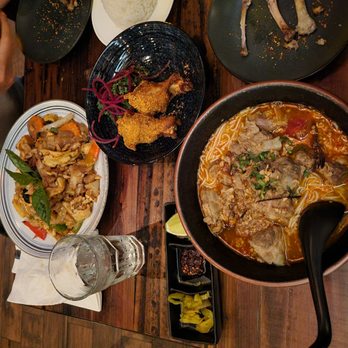 Ros Niyom Thai Restaurant - a table full of food - Thai Near Me - New York, New York