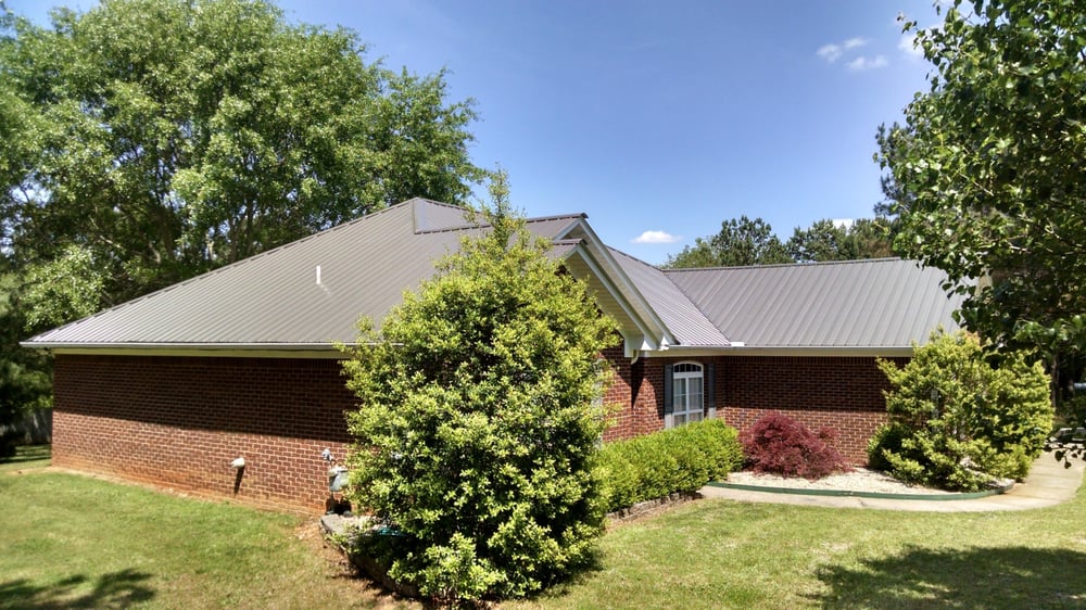 Slide of JC Metal Roofing