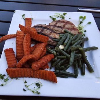 Florentine Restaurant - Grilled pork ribeye with sweet potato fries and green beans - Steakhouses Near Me - Germantown, Ohio