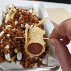 Super Tacos - Loaded fries special with chorizo.