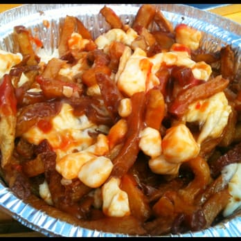 L'Authentique poutine and burger - Poutine!   (ketchup added by girlfriend,  sorry to the purists, ha) - Fast Food Near Me - Victoria, British Columbia