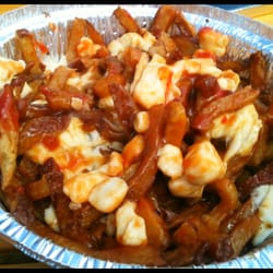 L'Authentique poutine and burger - Poutine!   (ketchup added by girlfriend,  sorry to the purists, ha)