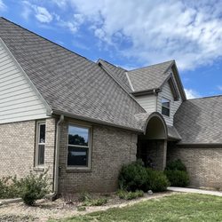 Turtle Roofing - After... looks wonderful with new shingles, gutters and gutter shields too!
