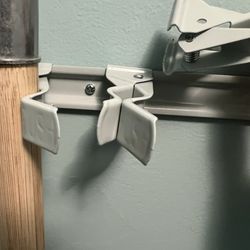 Lowe's Home Improvement - Sliding wall clamp unit - one clamp's metal connector popped apart after two weeks!