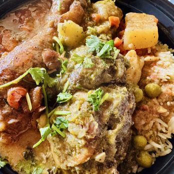 Chicha y Cafe - Two types of chicken stew over rice - Empanadas Near Me - Novato, California