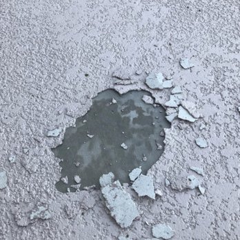 Hall's Deck Coating - Shards of deck coating lifted right off the bubble and surrounding area (other company). - General Contractors Near Me - Lake Elsinore, California