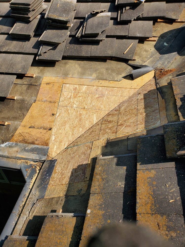 Slide of Arbiter Roofing