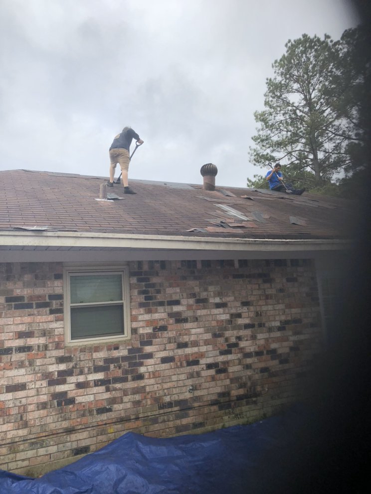 Slide of Yank's Roofing