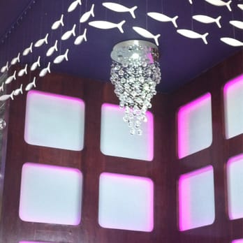 Sushi Tendou - Wall and ceiling behind the cute little corner booth. The colors behind the wall tiles change. - Japanese Near Me - Fulton, Maryland Sushi Tendou - Wall and ceiling behind the cute little corner booth. The colors behind the wall tiles change. - Japanese Near Me - Fulton, Maryland