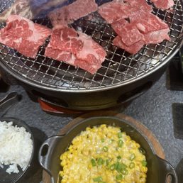 Short rib, brisket, rice, and corn cheese Short rib, brisket, rice, and corn cheese