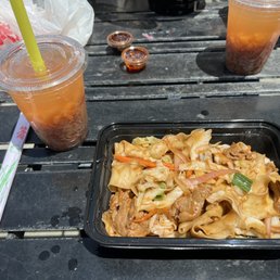 Lanzhou Beef Chow Mein and Goji Berry Ferminated Rice Drink with Strawberry and Pineapple Lanzhou Beef Chow Mein and Goji Berry Ferminated Rice Drink with Strawberry and Pineapple