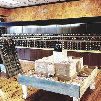 Figaro Market - a display of wine bottles and crates - Grocery Near Me - Newberry, South Carolina Figaro Market - a display of wine bottles and crates - Grocery Near Me - Newberry, South Carolina