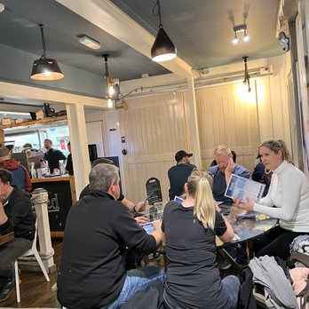 Hooked Seafood Restaurant - Seated colored group in front of restrooms. - Seafood Near Me - Galway, G
