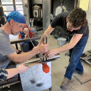The Melting Point - Using the jacks (aka giant tweezers) to shape the cactus base - Art Galleries Near Me - Sedona, Arizona The Melting Point - Using the jacks (aka giant tweezers) to shape the cactus base - Art Galleries Near Me - Sedona, Arizona