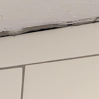 Midwest Rug - Grout over blue painters tape - Carpeting Near Me - Springfield, Missouri