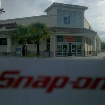 Walgreens - a snap on sign in front of a store - Drugstores Near Me - Daytona Beach, Florida