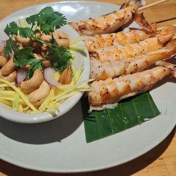 Manaow - Grilled Shrimp and Green Mango is so delicious. Shrimp has sesame oil coconut milk and marinade with green mango so delicious. - Thai Near Me - Long Beach, California Manaow - Grilled Shrimp and Green Mango is so delicious. Shrimp has sesame oil coconut milk and marinade with green mango so delicious. - Thai Near Me - Long Beach, California