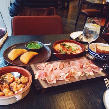 Mita's Restaurant and Bar - Gambas al ajilo, empanadas, serrano ham, pulpo gallego, and bread for the shrimp! - Spanish Near Me - Cincinnati, Ohio Mita's Restaurant and Bar - Gambas al ajilo, empanadas, serrano ham, pulpo gallego, and bread for the shrimp! - Spanish Near Me - Cincinnati, Ohio