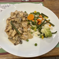 L'Ancienne Douane - Kids meal of Émincé de volaille, sauce crème and champignons - I was tempted to order it!