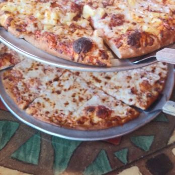 Palio's Pizza Cafe - Pineapple bacon pizza on top cheese pizza on bottom - Pizza Near Me - Mansfield, Texas