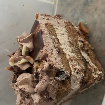 Scratch Bakery Cafe - This is a slice of the marble cake with the mocha buttercream frosting. Absolutey divine cake but more frosting than substance. - Cafes Near Me - Laguna Hills, California Scratch Bakery Cafe - This is a slice of the marble cake with the mocha buttercream frosting. Absolutey divine cake but more frosting than substance. - Cafes Near Me - Laguna Hills, California