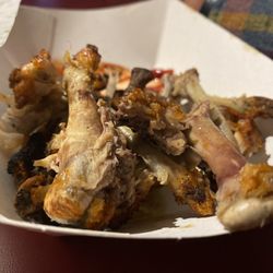 Points East Pub - Doing work on the delicious wings.  Yummy!!