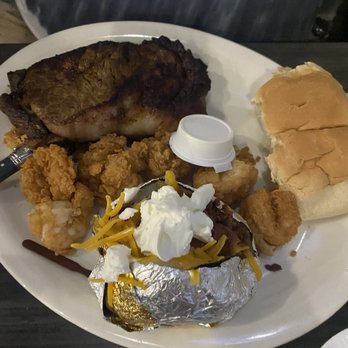 Doc's Seafood & Steaks - Ribeye -not recommended, fried shrimp and loaded potato, both highly recommend - Seafood Near Me - Orange Beach, Alabama