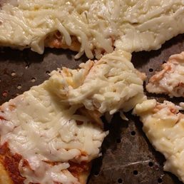 We ordered a regular cheese pizza from them and this is what we got. We ordered a regular cheese pizza from them and this is what we got.