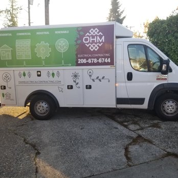 Ohm Electrical Contracting - a truck parked in a lot - Electricians Near Me Ohm Electrical Contracting - a truck parked in a lot - Electricians Near Me