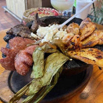 La Parrilla Guacamole Grill - Molcajete, with pretty much everything. Beef, chicken, shrimp, cactus, sausage. - Mexican Near Me - Stanton, California La Parrilla Guacamole Grill - Molcajete, with pretty much everything. Beef, chicken, shrimp, cactus, sausage. - Mexican Near Me - Stanton, California