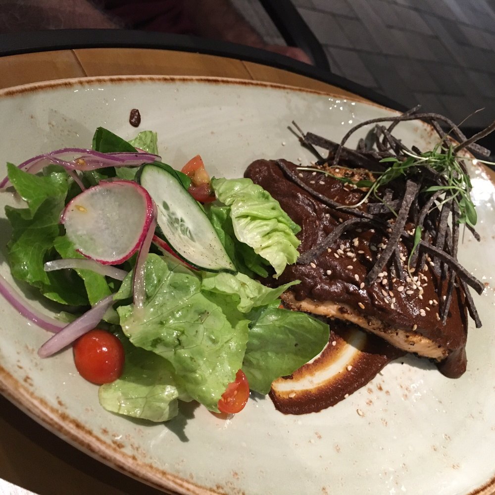 La Cocina - Crusted salmon with mole, served with salad - delicious! - International Near Me - Playa del Carmen, ROO La Cocina - Crusted salmon with mole, served with salad - delicious! - International Near Me - Playa del Carmen, ROO