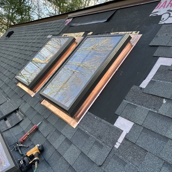 EM Certified Construction - New skylight insulation - Roofing Near Me