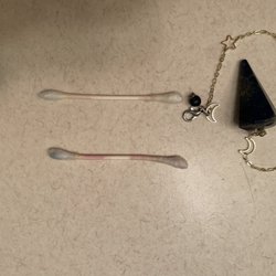 Divine Time - The dye that rubbed off of each pendulum