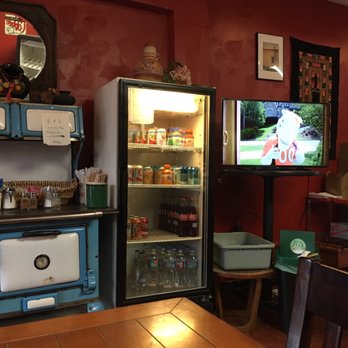 Cafetal Quilombo Cafe - Cute antique stove, watching the Seahawks game on tv! - Cafes Near Me - Seattle, Washington Cafetal Quilombo Cafe - Cute antique stove, watching the Seahawks game on tv! - Cafes Near Me - Seattle, Washington