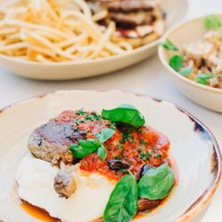The Carleton - Duck (gf) confit duck leg cacciatore, olive, caper, San Marzano tomato, potato purée