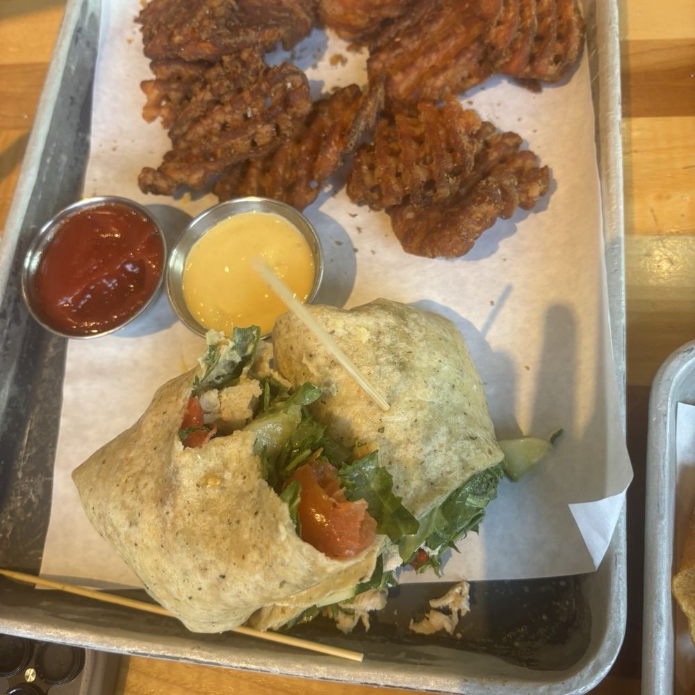Four Day Ray Brewing - Hummus wrap with sweet potato waffle fries - Breweries Near Me - Fishers, Indiana Four Day Ray Brewing - Hummus wrap with sweet potato waffle fries - Breweries Near Me - Fishers, Indiana