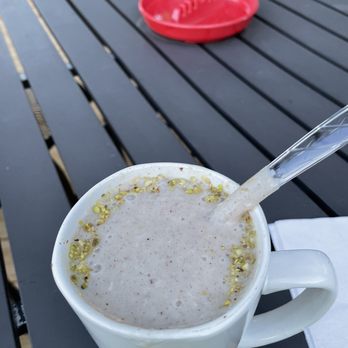Aladdin Sheesha & Cafe - a cup of coffee on a table - Hookah Bars Near Me - Tallahassee, Florida Aladdin Sheesha & Cafe - a cup of coffee on a table - Hookah Bars Near Me - Tallahassee, Florida