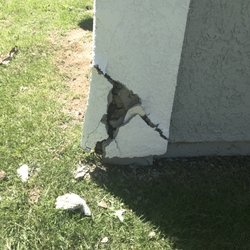 Westmont of Riverside - Stucco that has not been repaired on side of patio