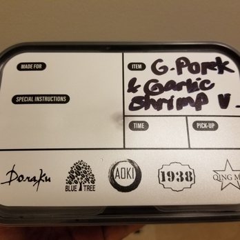 Qing Mu - Takeout container is sturdy enough to reuse and has the logos of all of the restaurants in the Aoki Group - Noodles Near Me - Honolulu, Hawaii