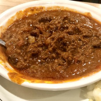Huddle House - Hearty bowl of chili with chopped onions on the side. - American Near Me - Forney, Texas