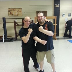 Syracuse Martial Arts Academy - Me with Sifu Iglesias after a seminar.